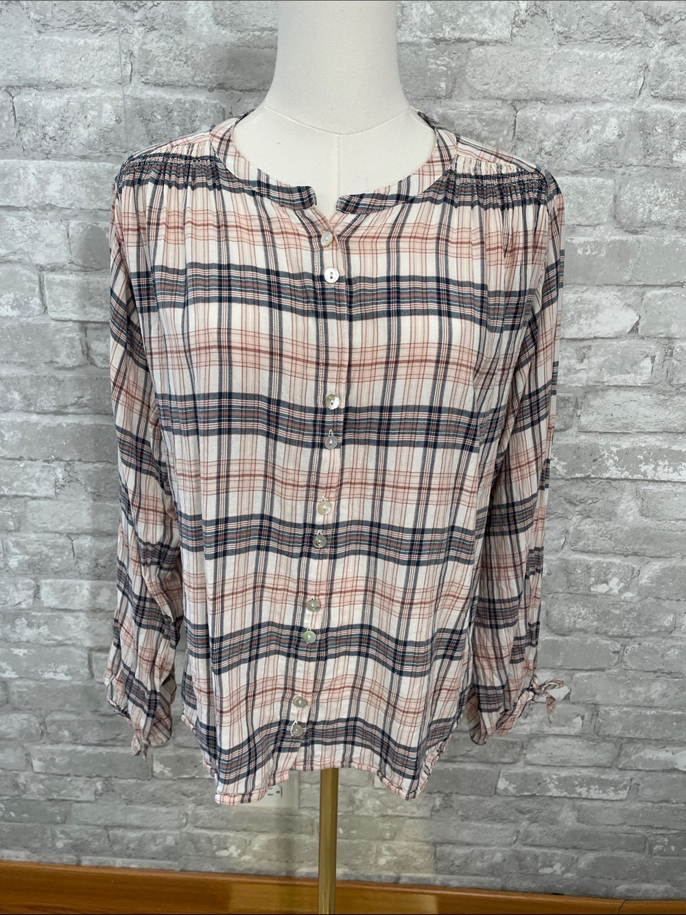 Faherty Everleigh Top features a cream, pink, and navy plaid pattern